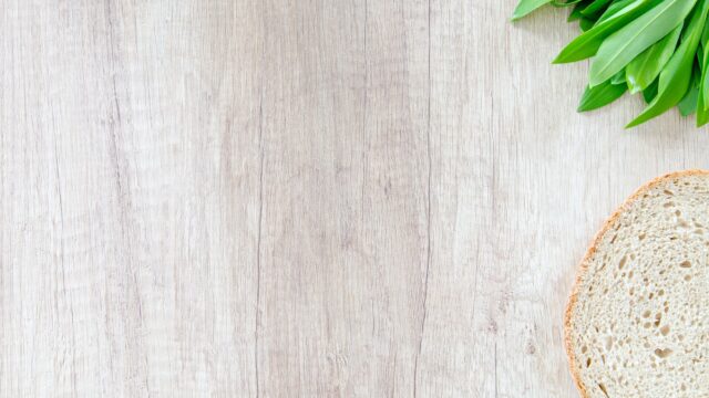 sliced bread on brown wooden board